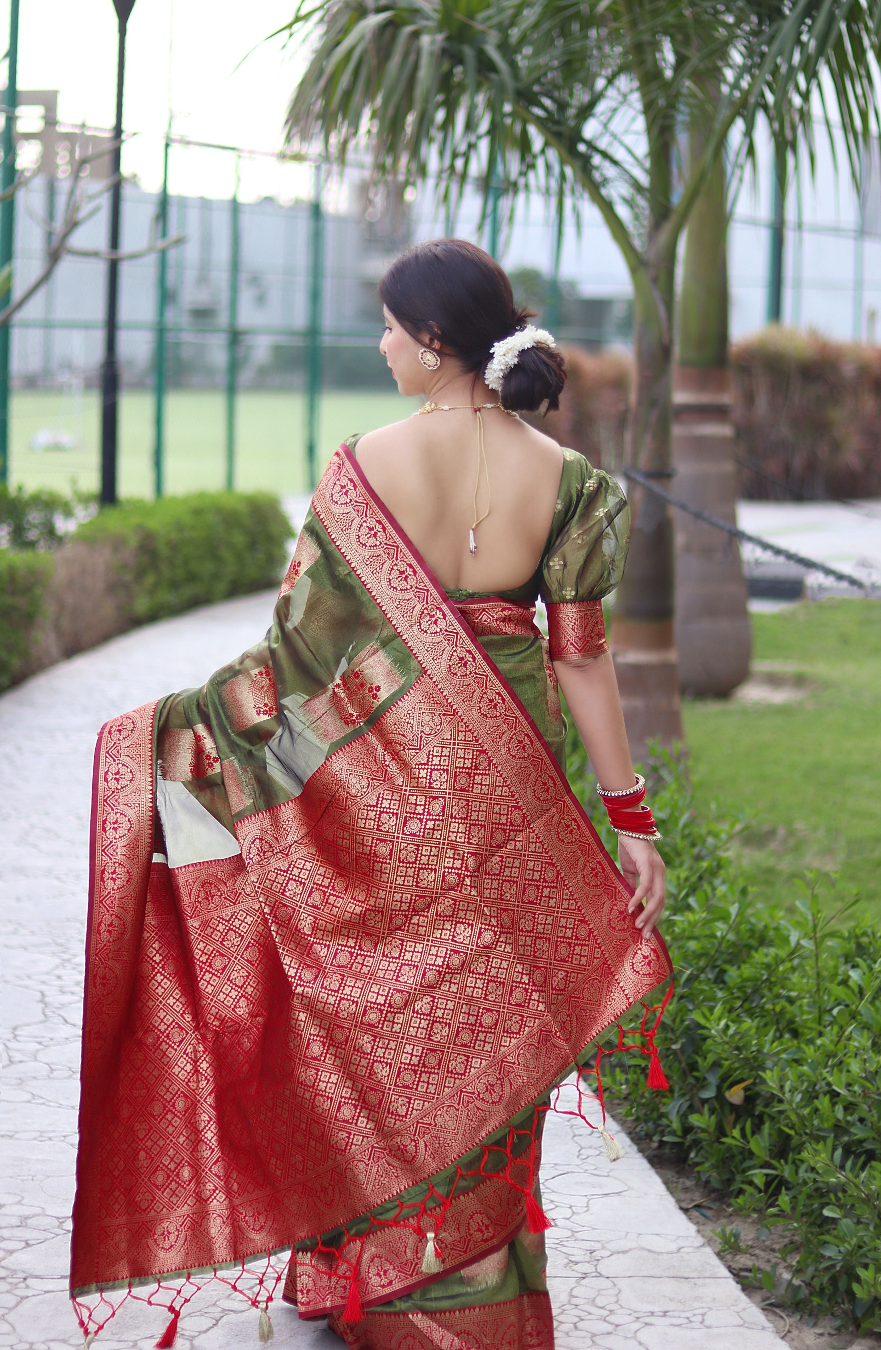 Satisfying Green Organza Silk Saree With Transcendent Blouse Piece