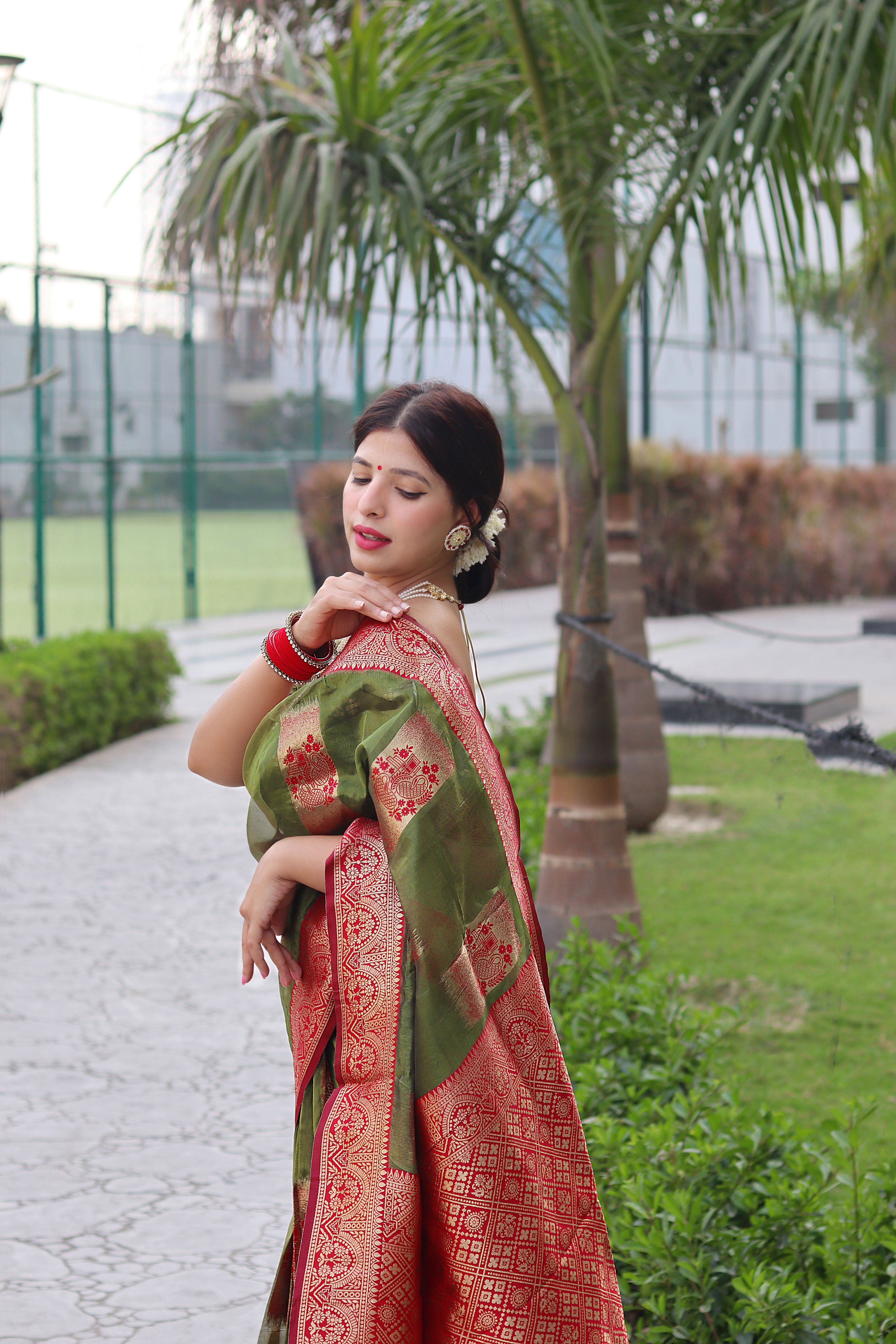 Satisfying Green Organza Silk Saree With Transcendent Blouse Piece