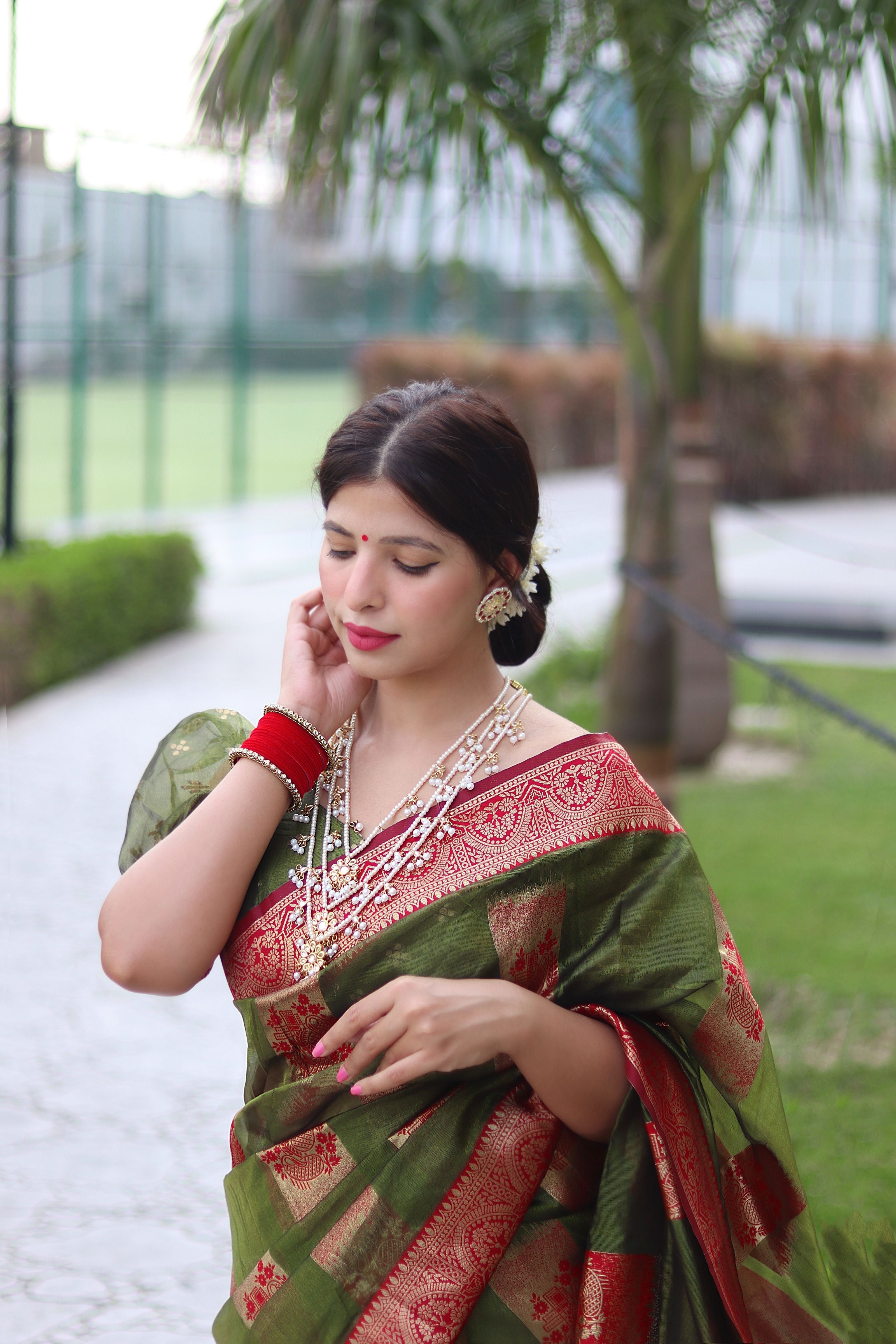 Satisfying Green Organza Silk Saree With Transcendent Blouse Piece