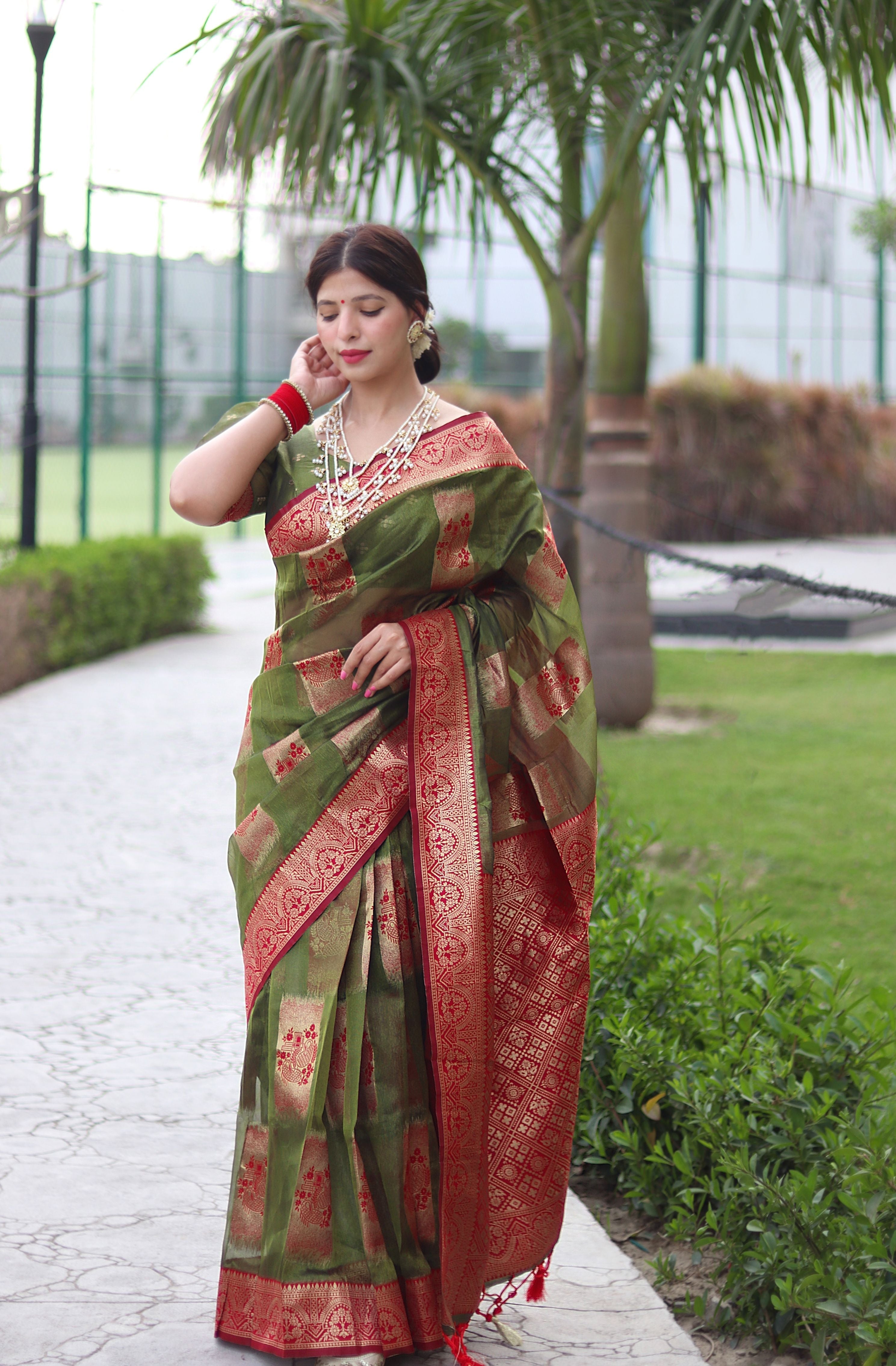Satisfying Green Organza Silk Saree With Transcendent Blouse Piece