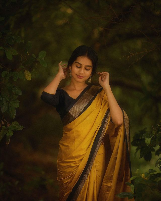 Caressing Yellow Banarasi Silk Saree With Poetic Blouse Piece