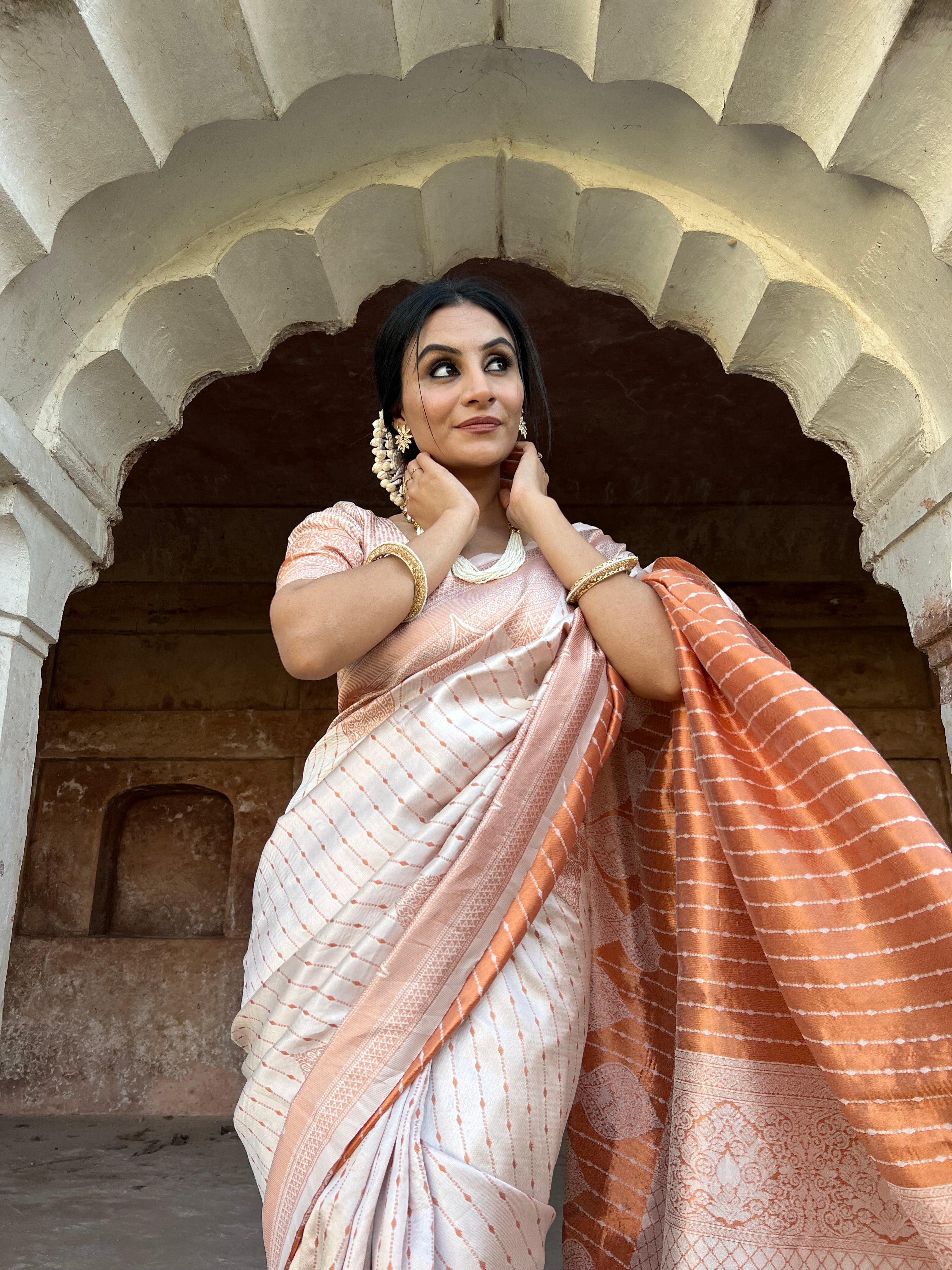 Glittering Off White Soft Silk Saree With Tempting Blouse Piece