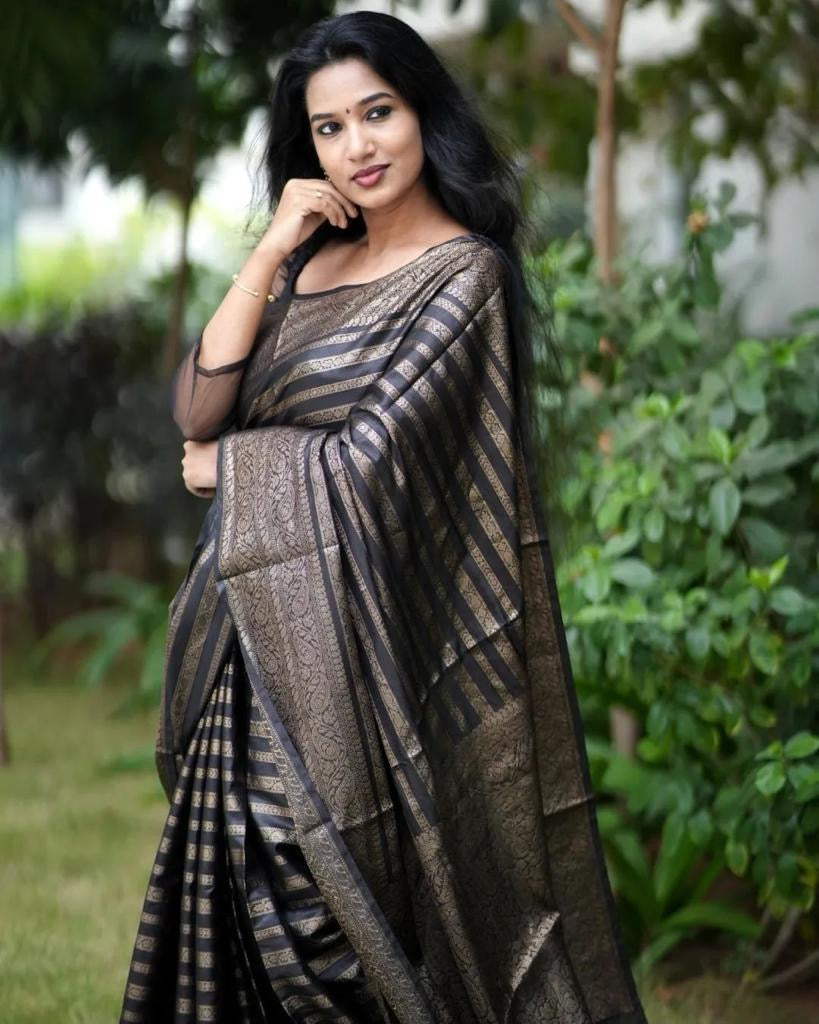Jazzy Black Soft Silk Saree With Desiring Blouse Piece