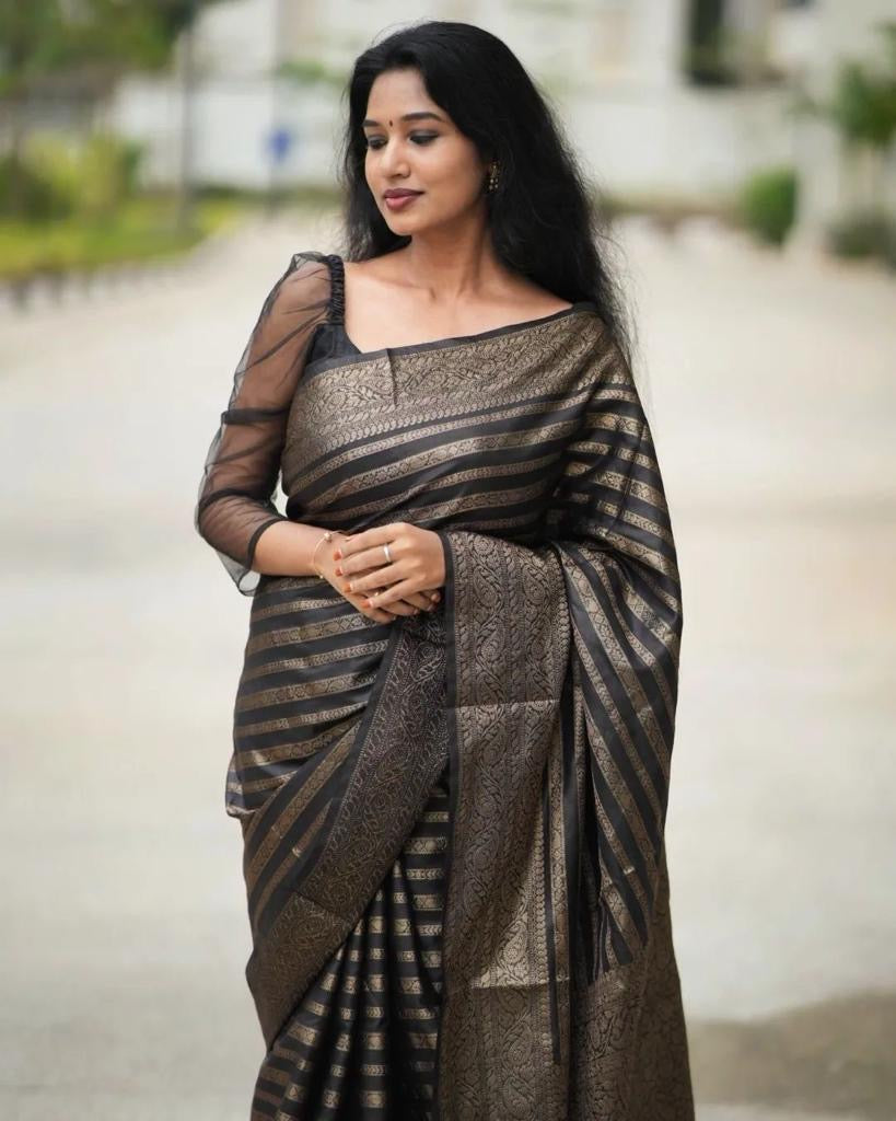 Jazzy Black Soft Silk Saree With Desiring Blouse Piece