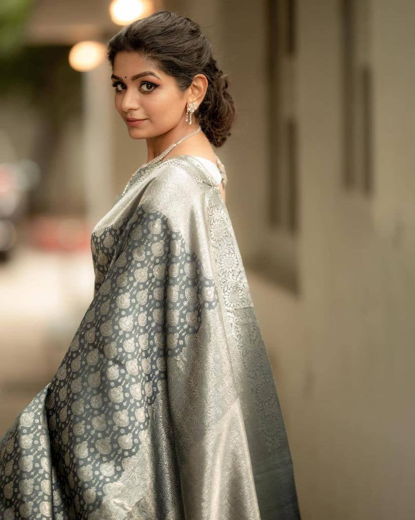 Gorgeous Grey Soft Silk Saree With Alluring Blouse Piece