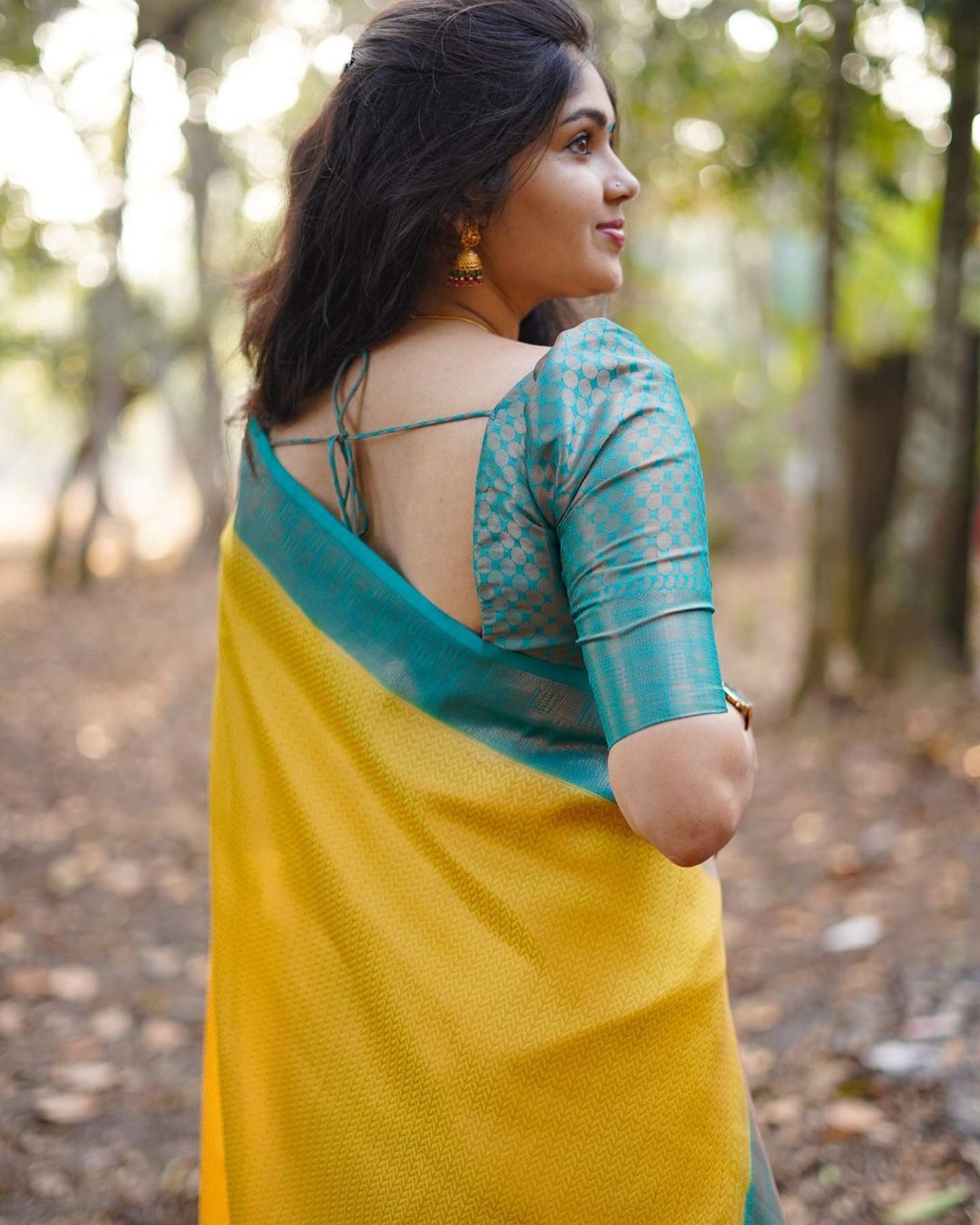 Mesmerising Yellow Soft Silk Saree With Delightful Blouse Piece