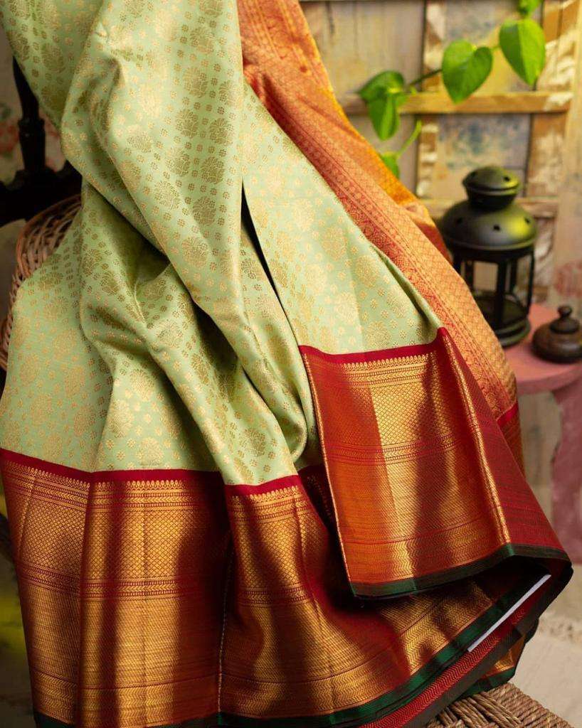 Tasteful Pista Banarasi Silk Saree With Graceful Blouse Piece
