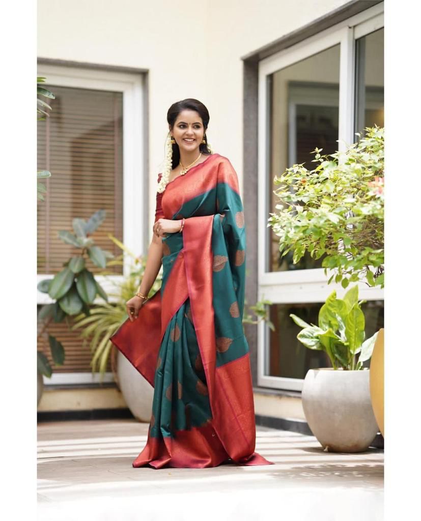 Engrossing Rama Banarasi Silk Saree With Unique Blouse Piece