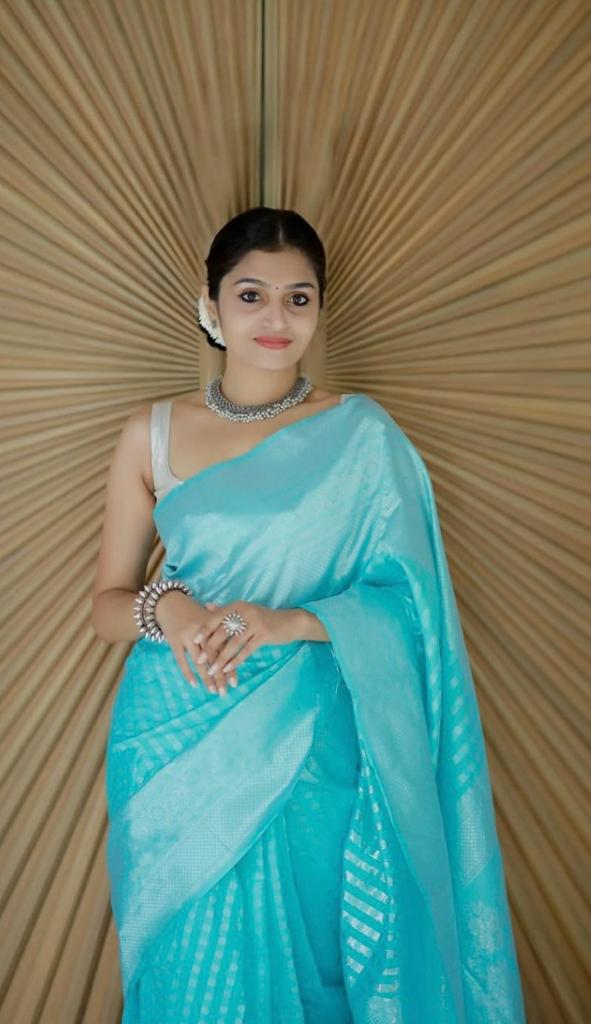Elegant Firozi Soft Silk Saree With Outstanding Blouse