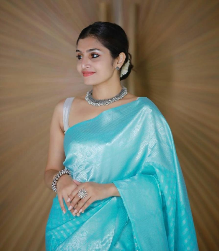 Elegant Firozi Soft Silk Saree With Outstanding Blouse