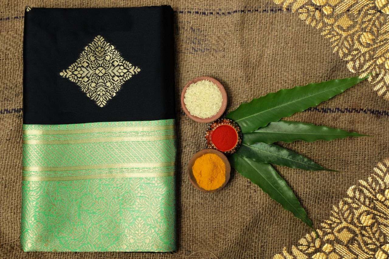 Exquisite Black Soft Silk Saree With Attractive Light Green Blouse