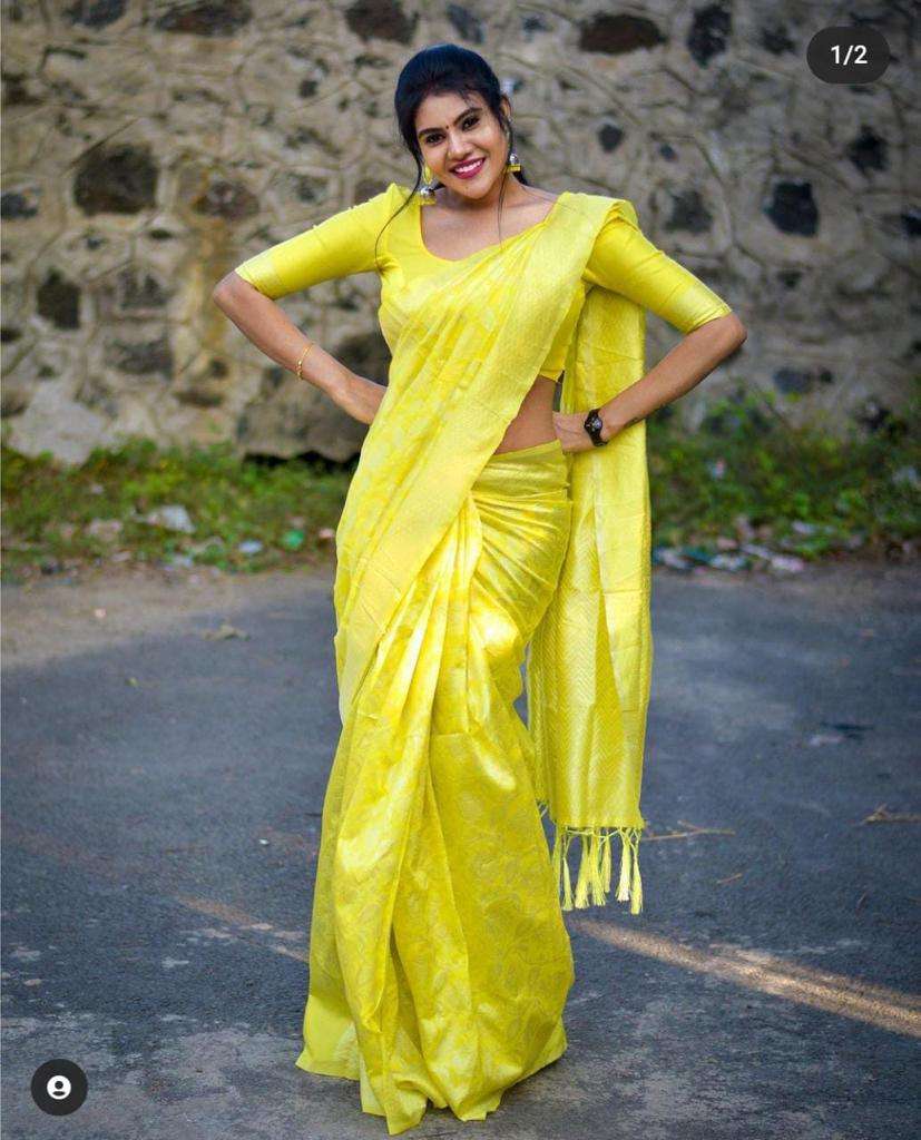 Striking Yellow Soft Silk Saree With Miraculous Blouse Piece