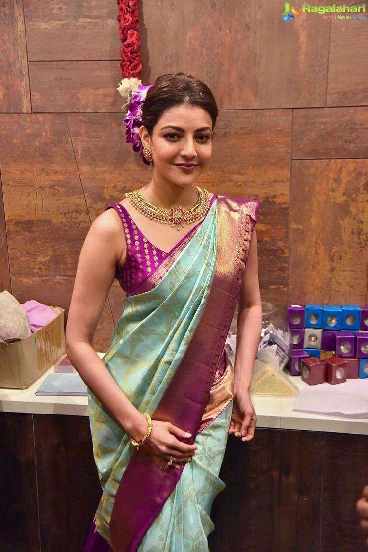 Fascinating Firozi Banarasi Silk Saree With Attractive Blouse Piece