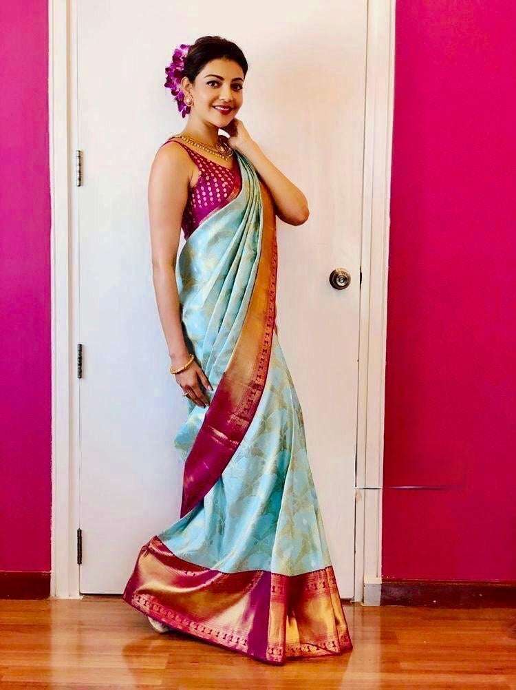 Fascinating Firozi Banarasi Silk Saree With Attractive Blouse Piece