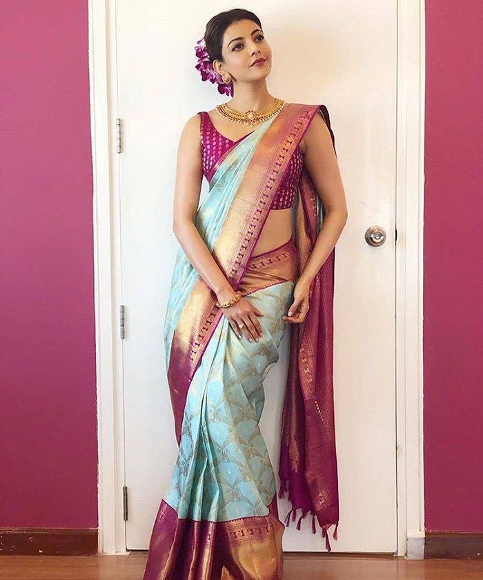 Fascinating Firozi Banarasi Silk Saree With Attractive Blouse Piece