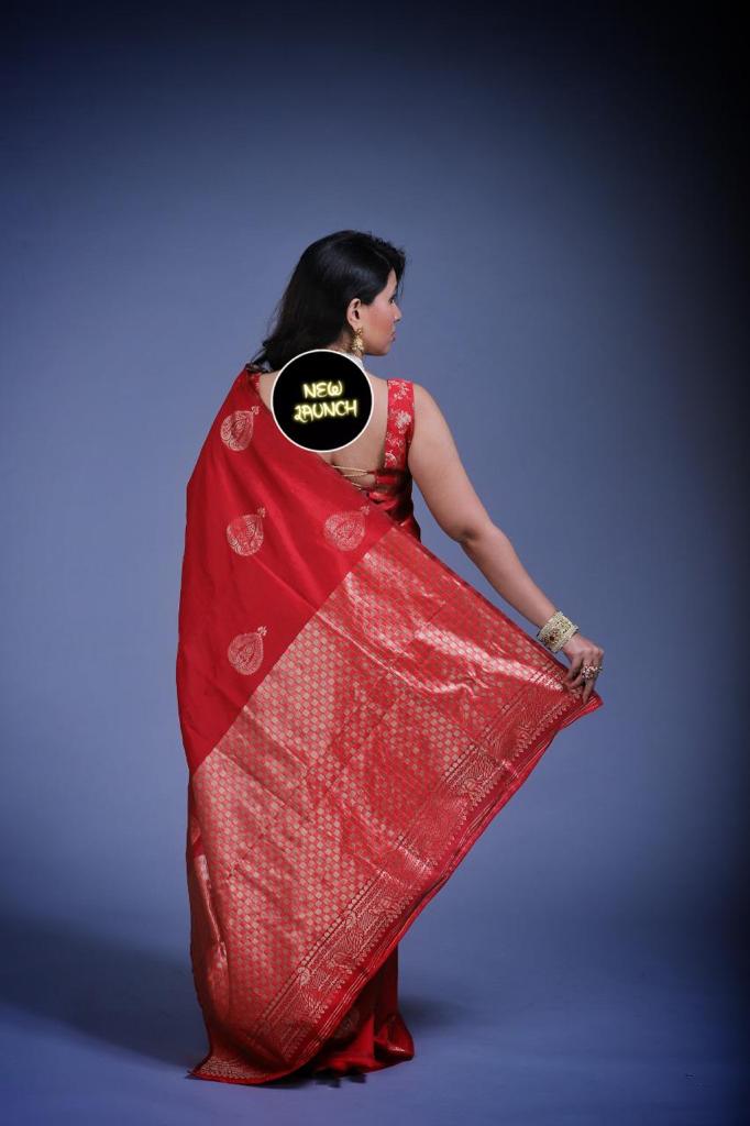 Adorable Red Banarasi Silk Saree With Elegant Blouse Piece