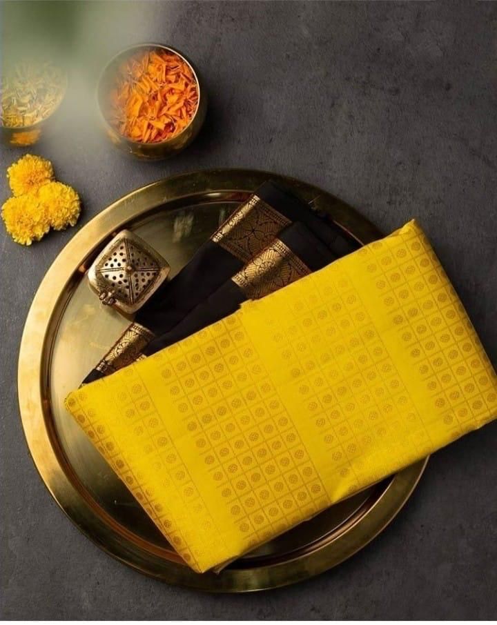 Lovely Yellow Banarasi Silk Saree With Gorgeous Blouse Piece