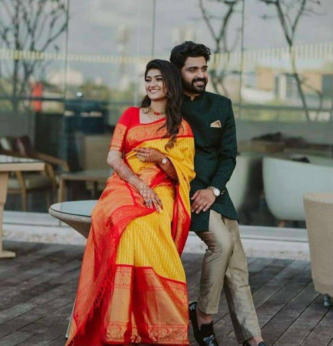 Pleasing Yellow Banarasi Silk Saree With Striking Blouse Piece