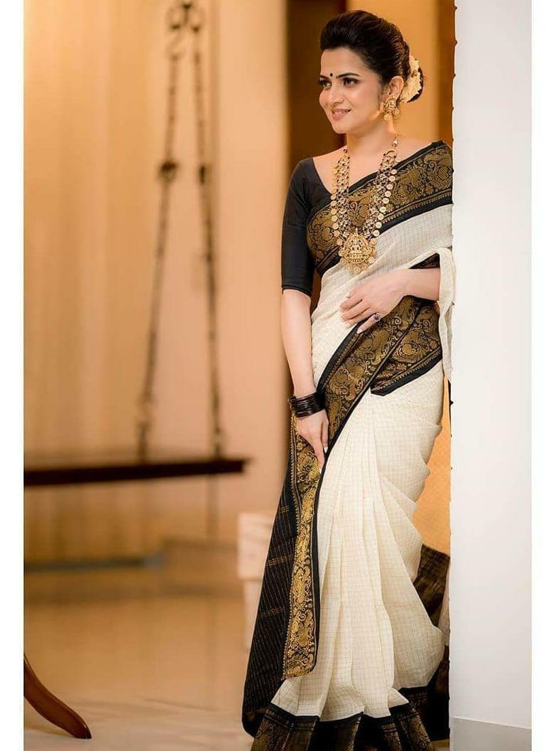 Demure Off White Banarasi Silk Saree With Felicitous Blouse Piece