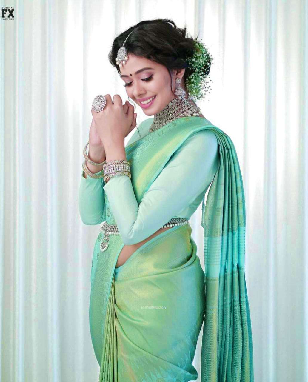 Classy Sea Green Banarasi Silk Saree With Ethereal Blouse Piece