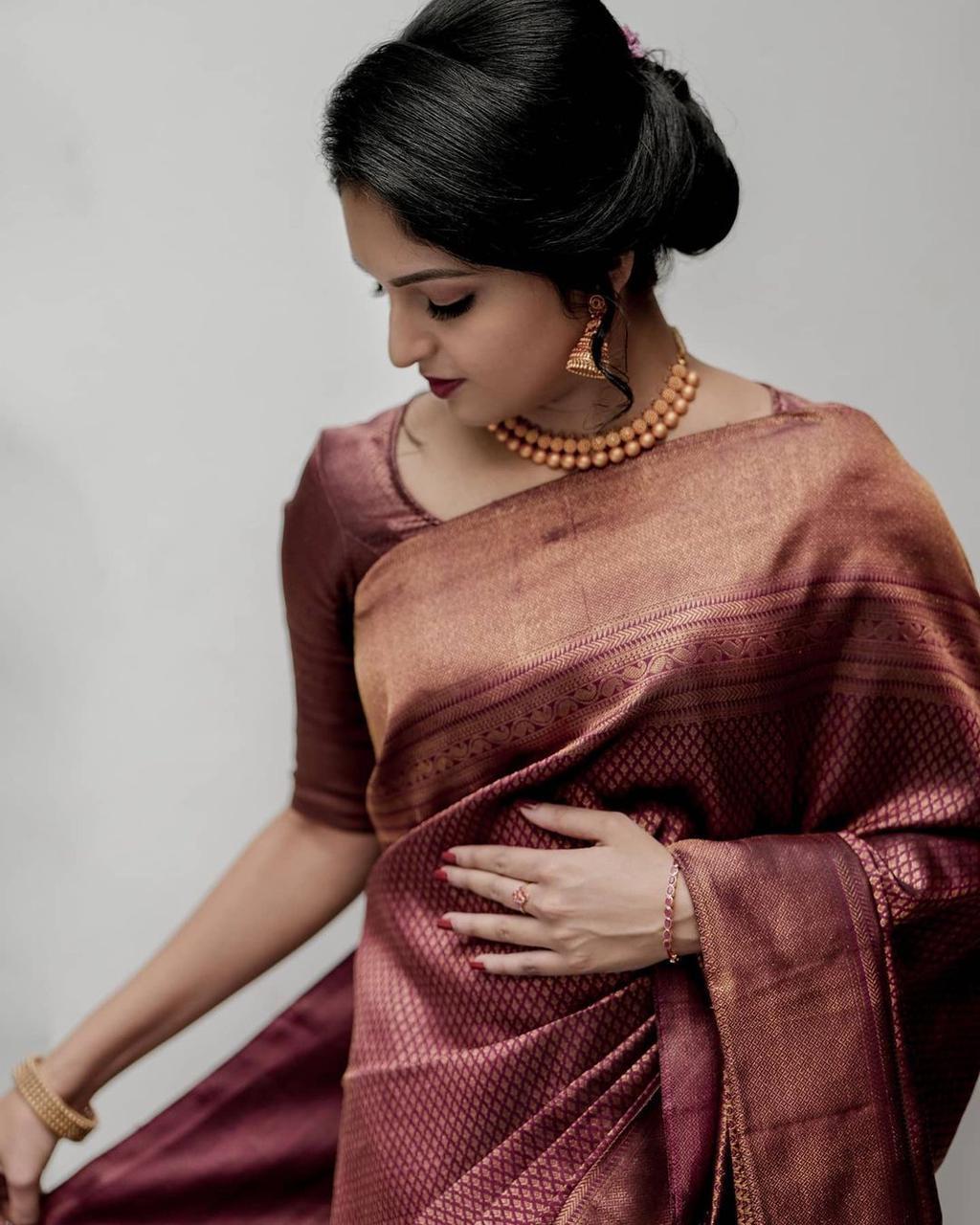 Dreamy Maroon Kanjivaram Silk Saree With Enchanting Blouse Piece