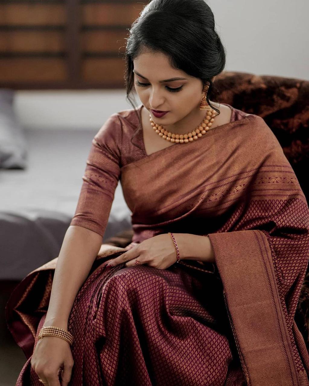 Dreamy Maroon Kanjivaram Silk Saree With Enchanting Blouse Piece