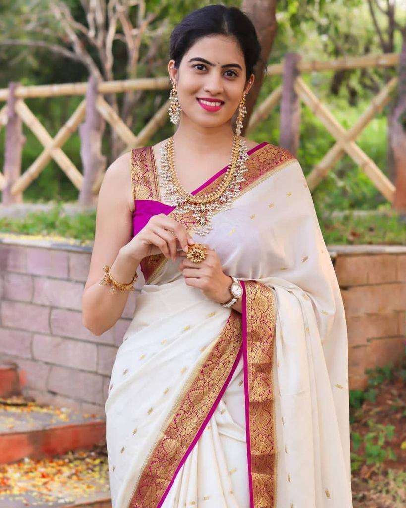 Captivating White Soft Silk Saree With Unique Blouse Piece