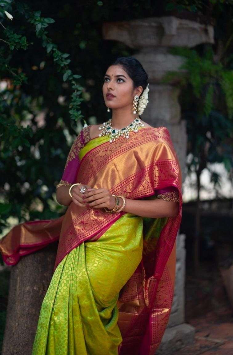 Trendy Light Green Banarasi Silk Saree With Exceptional Blouse Piece