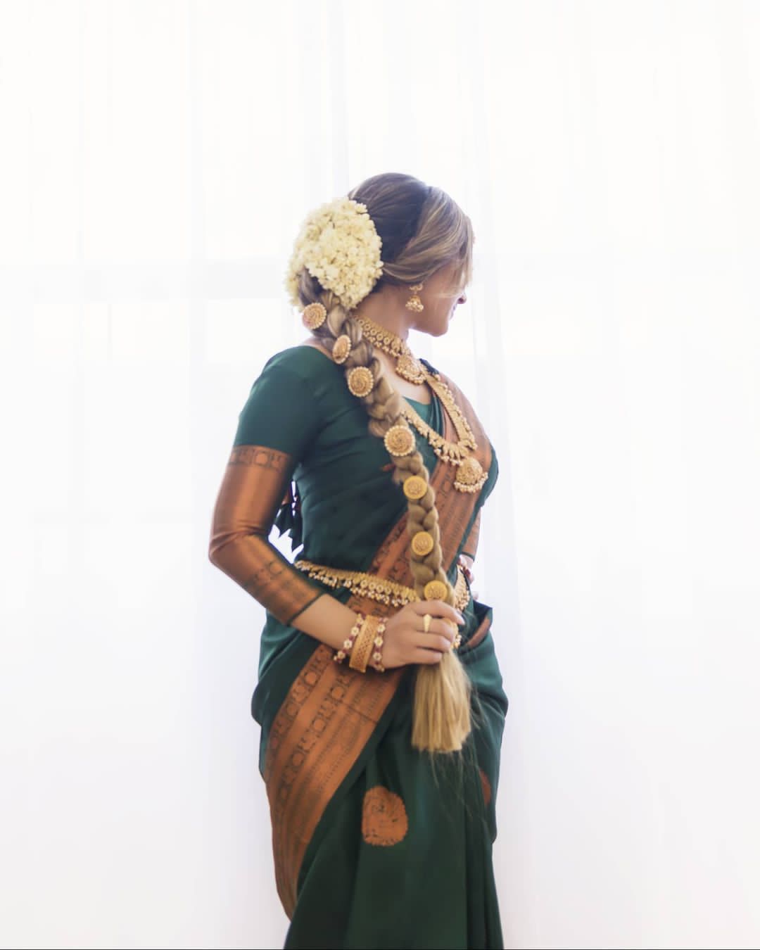 Glamorous Green Banarasi Silk Saree With Indelible Blouse Piece