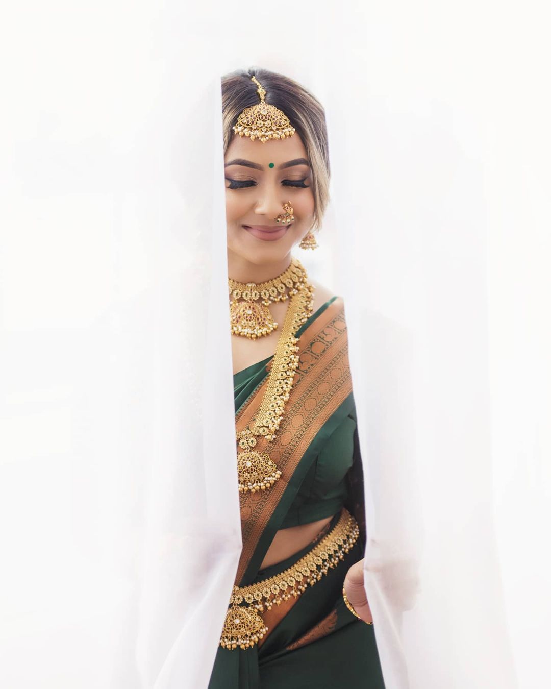Glamorous Green Banarasi Silk Saree With Indelible Blouse Piece