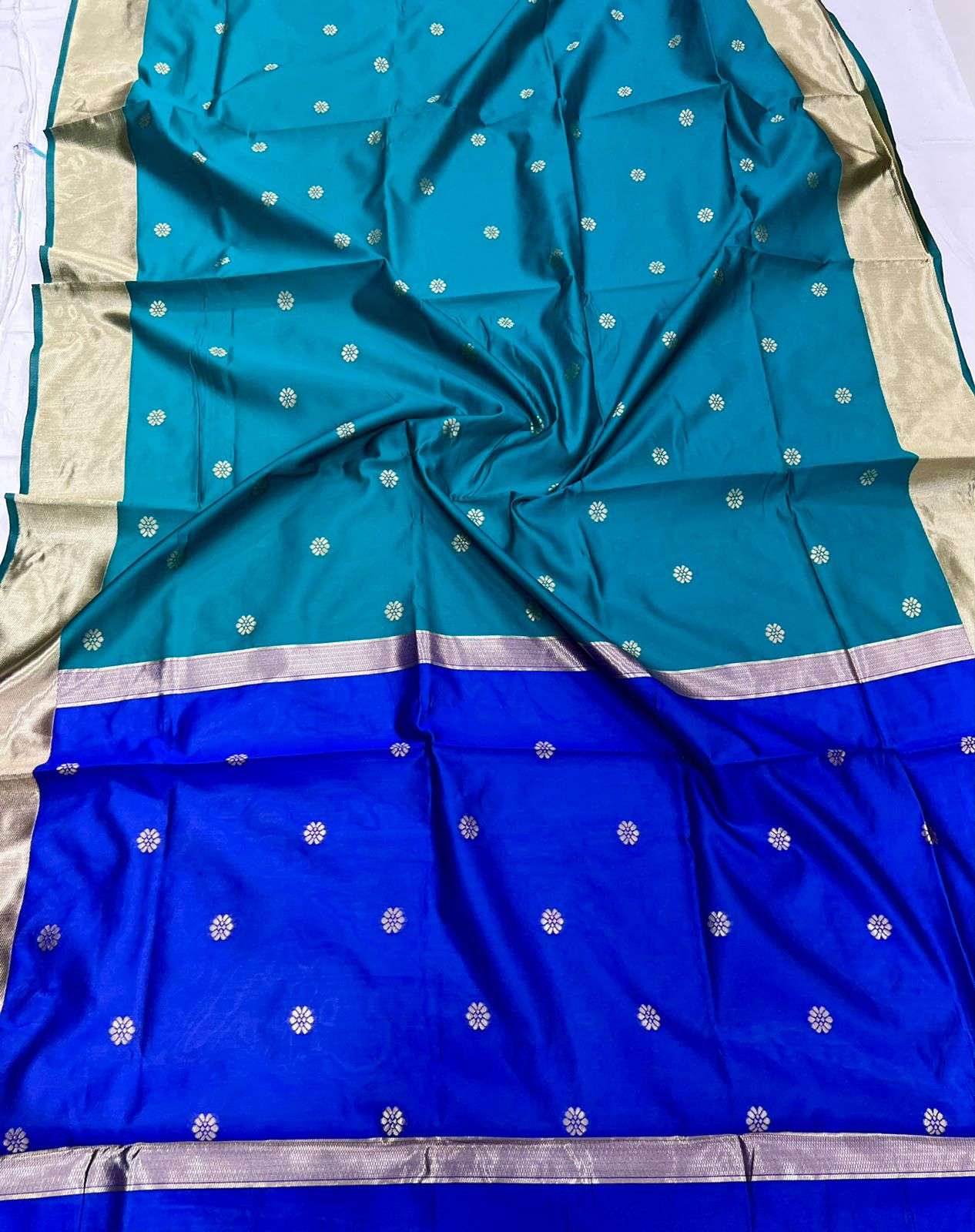 Striking Rama Soft Silk Saree With Profuse Blouse Piece
