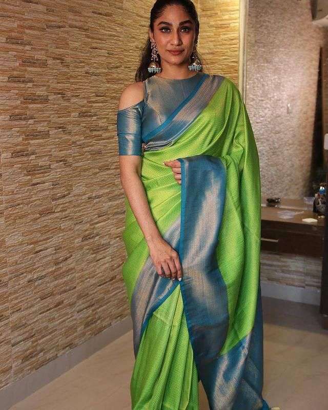 Glittering Parrot Soft Silk Saree With Unique Blouse Piece