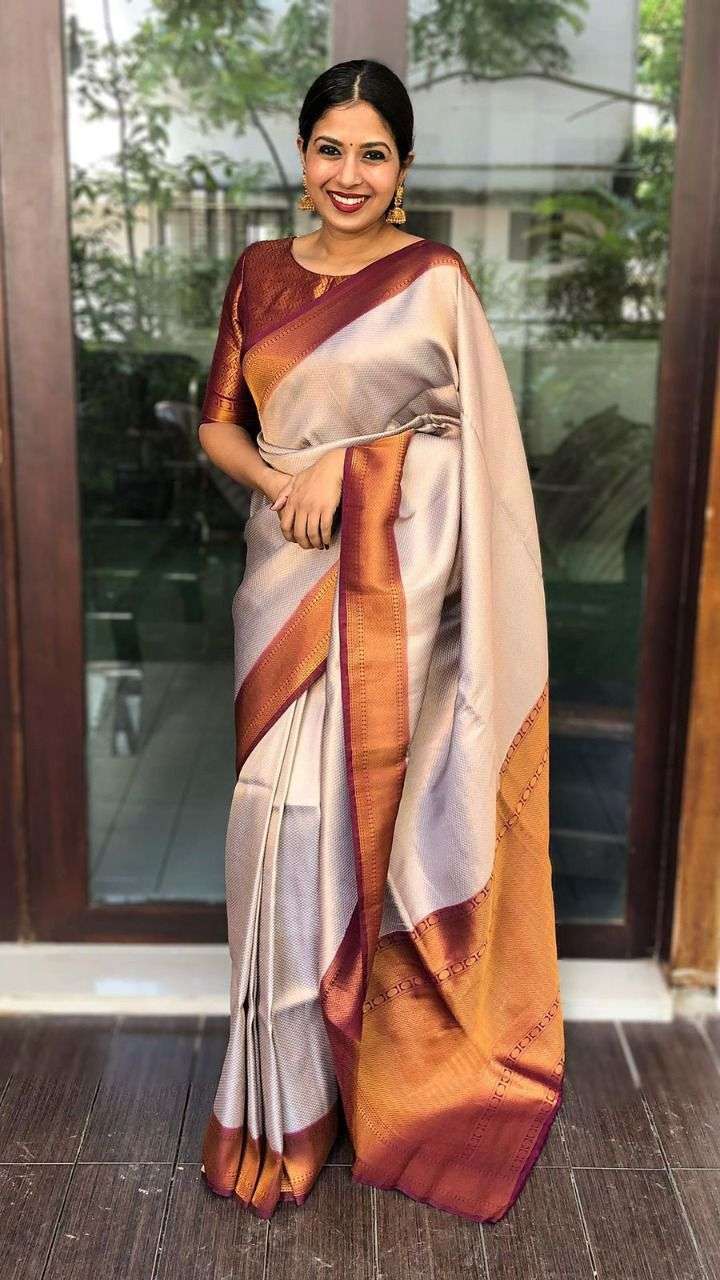 Captivating Beige Soft Silk Saree With Unique Blouse Piece
