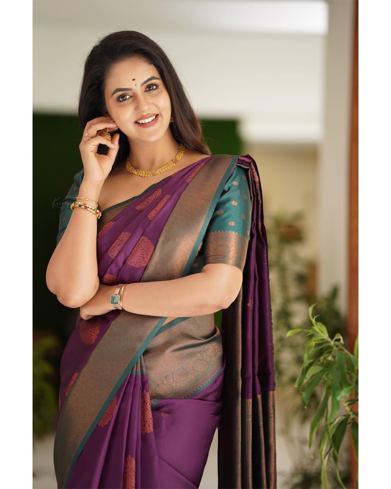 Glowing Purple Banarasi Silk Saree With Engrossing Blouse Piece
