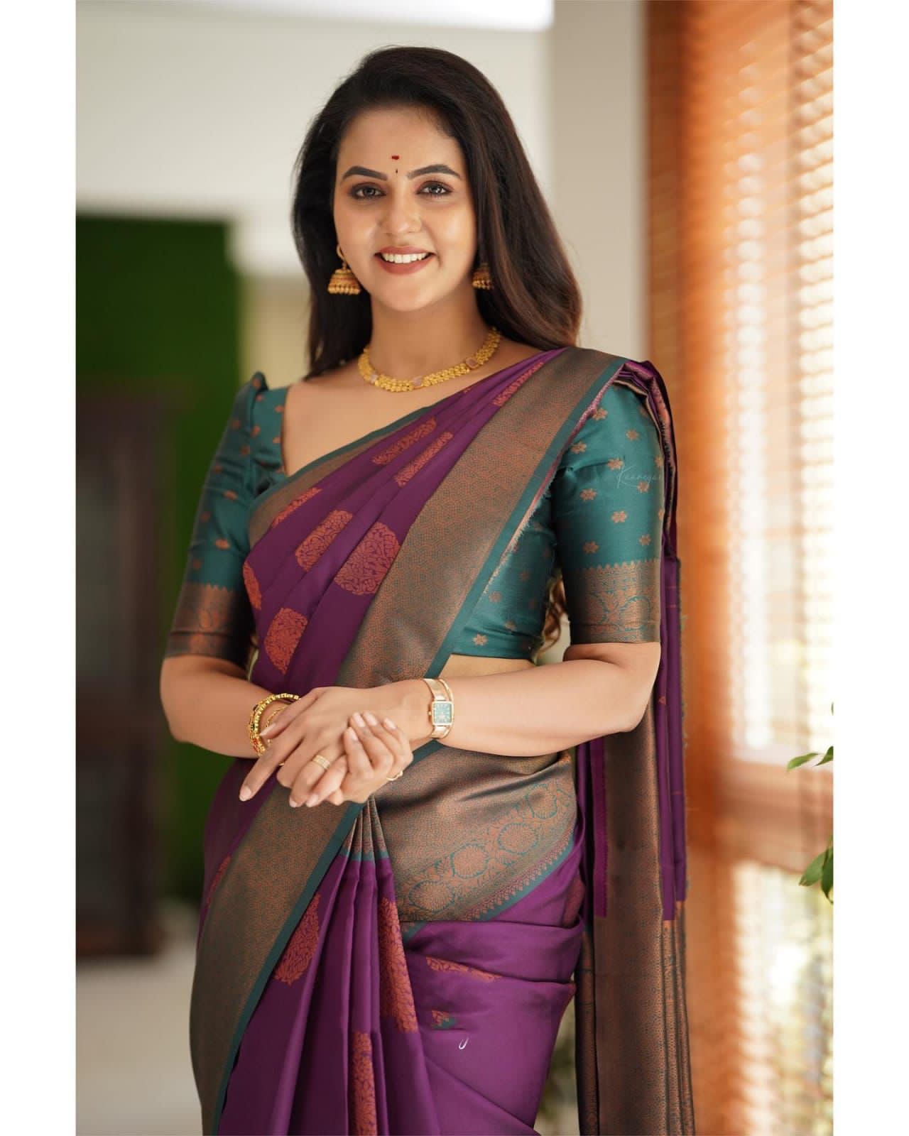 Glowing Purple Banarasi Silk Saree With Engrossing Blouse Piece