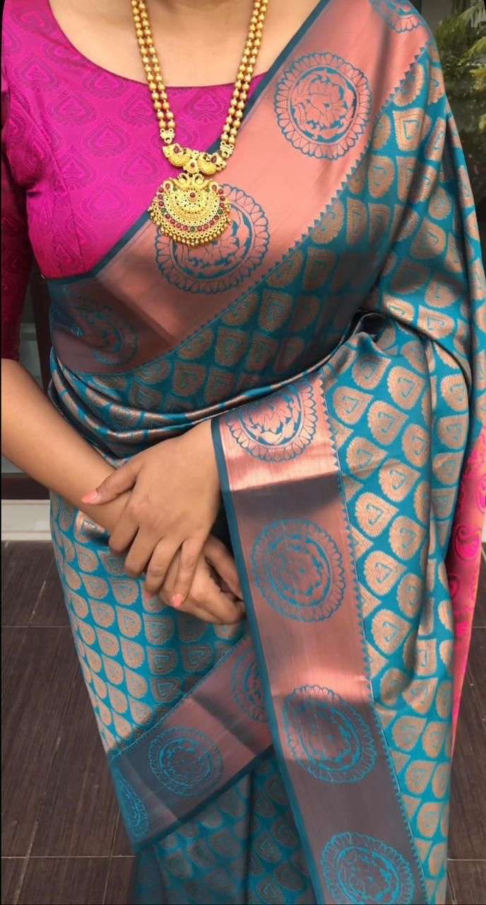 Innovative Firozi Banarasi Silk Saree With Extraordinary Blouse Piece