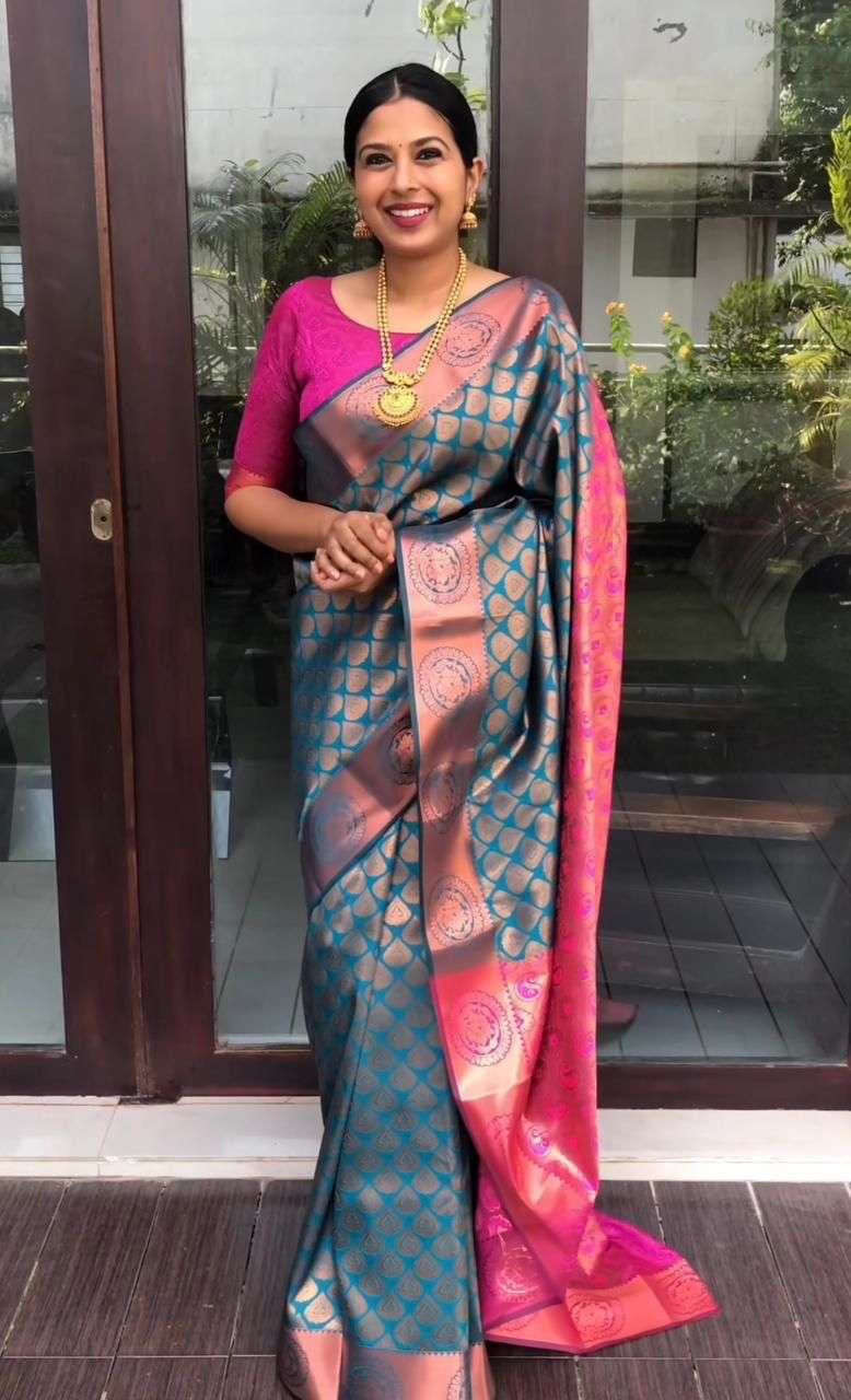 Innovative Firozi Banarasi Silk Saree With Extraordinary Blouse Piece