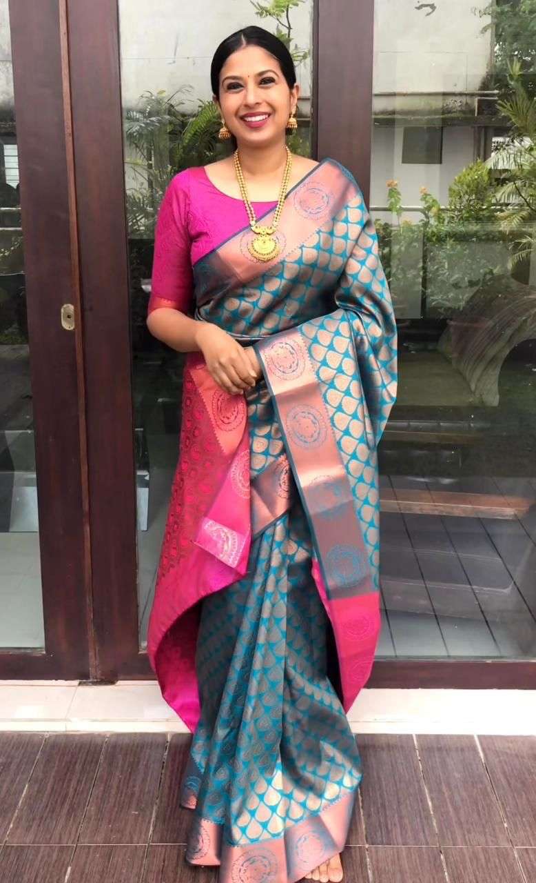 Innovative Firozi Banarasi Silk Saree With Extraordinary Blouse Piece