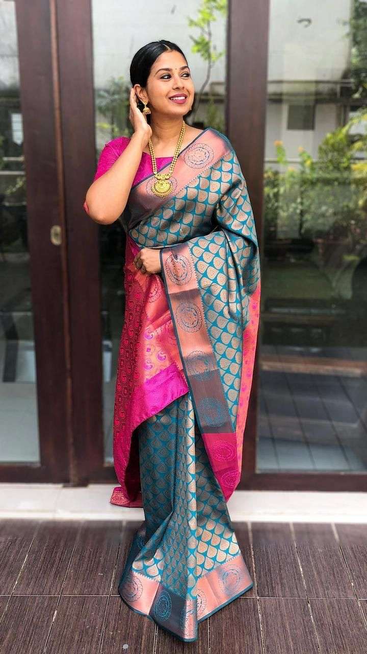 Innovative Firozi Banarasi Silk Saree With Extraordinary Blouse Piece