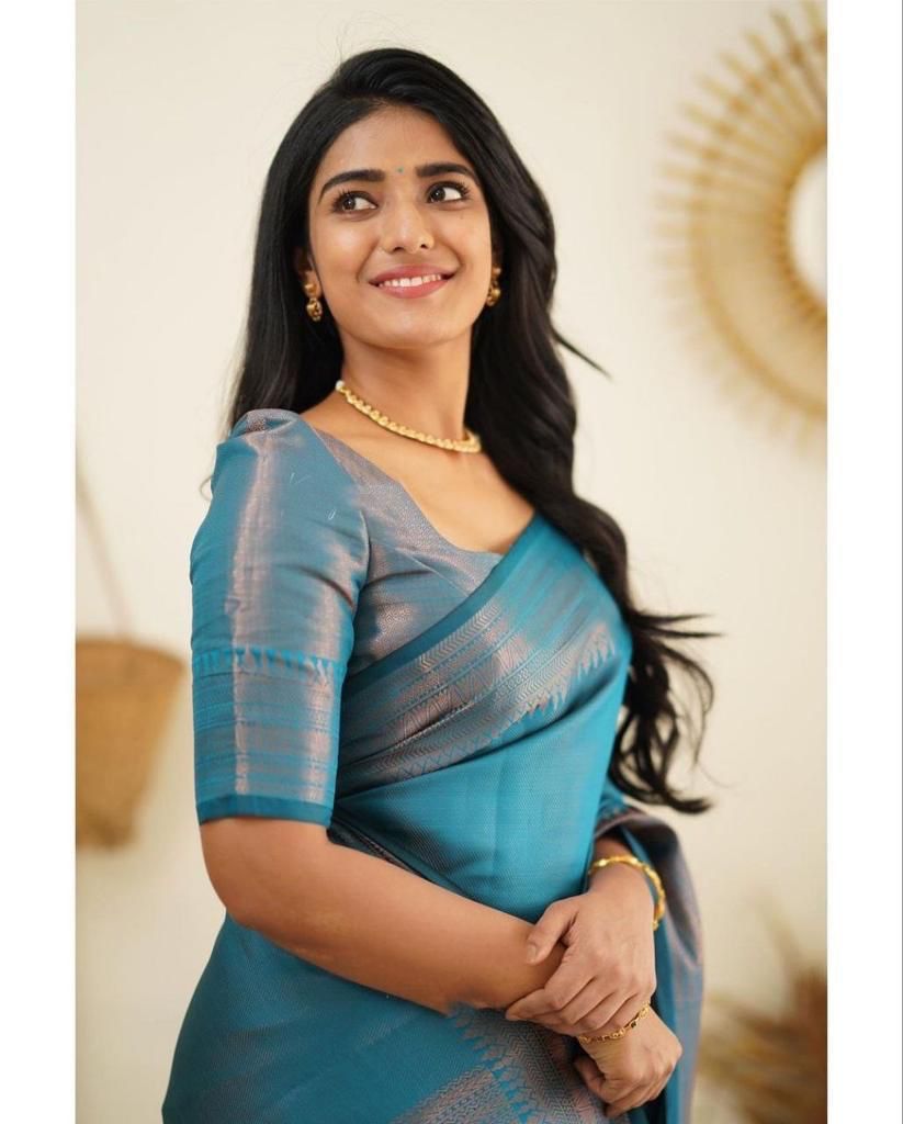 Surreptitious Firozi Soft Silk Saree With Exuberant Blouse Piece