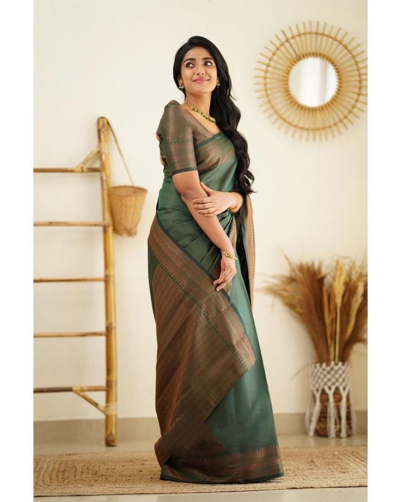 Saintly Green Soft Silk Saree With Smashing Blouse Piece