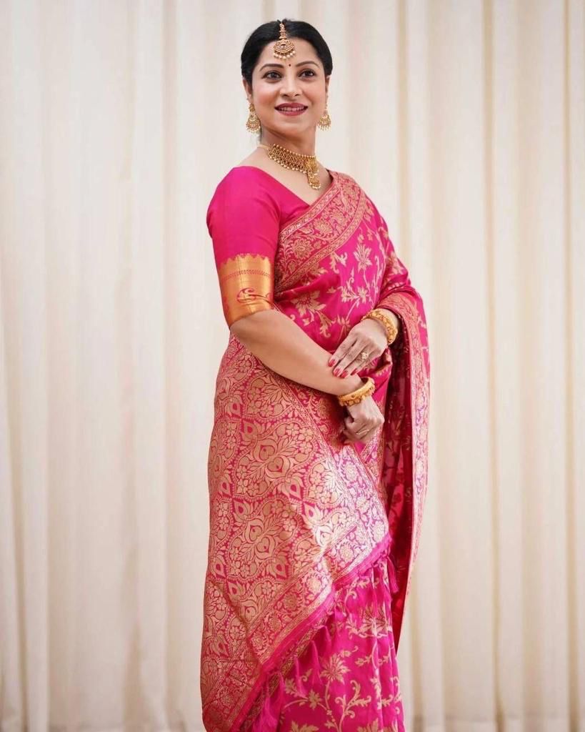 Snazzy Dark Pink Banarasi Silk Saree With Evocative Blouse Piece