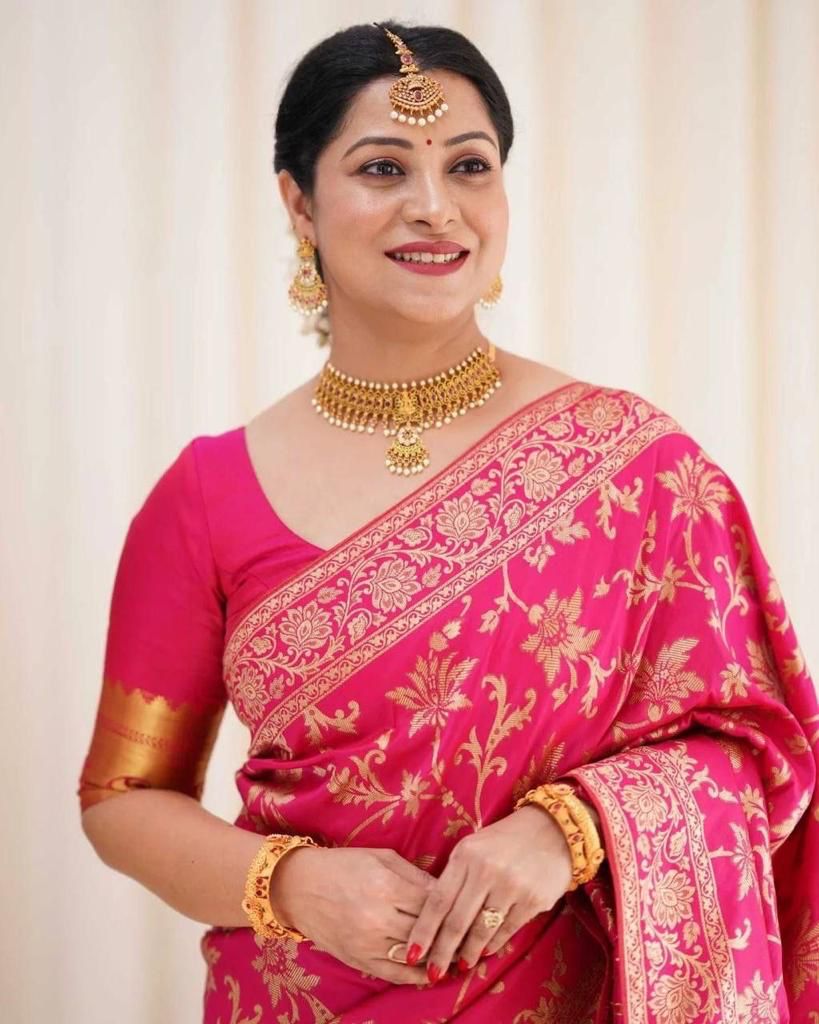 Snazzy Dark Pink Banarasi Silk Saree With Evocative Blouse Piece