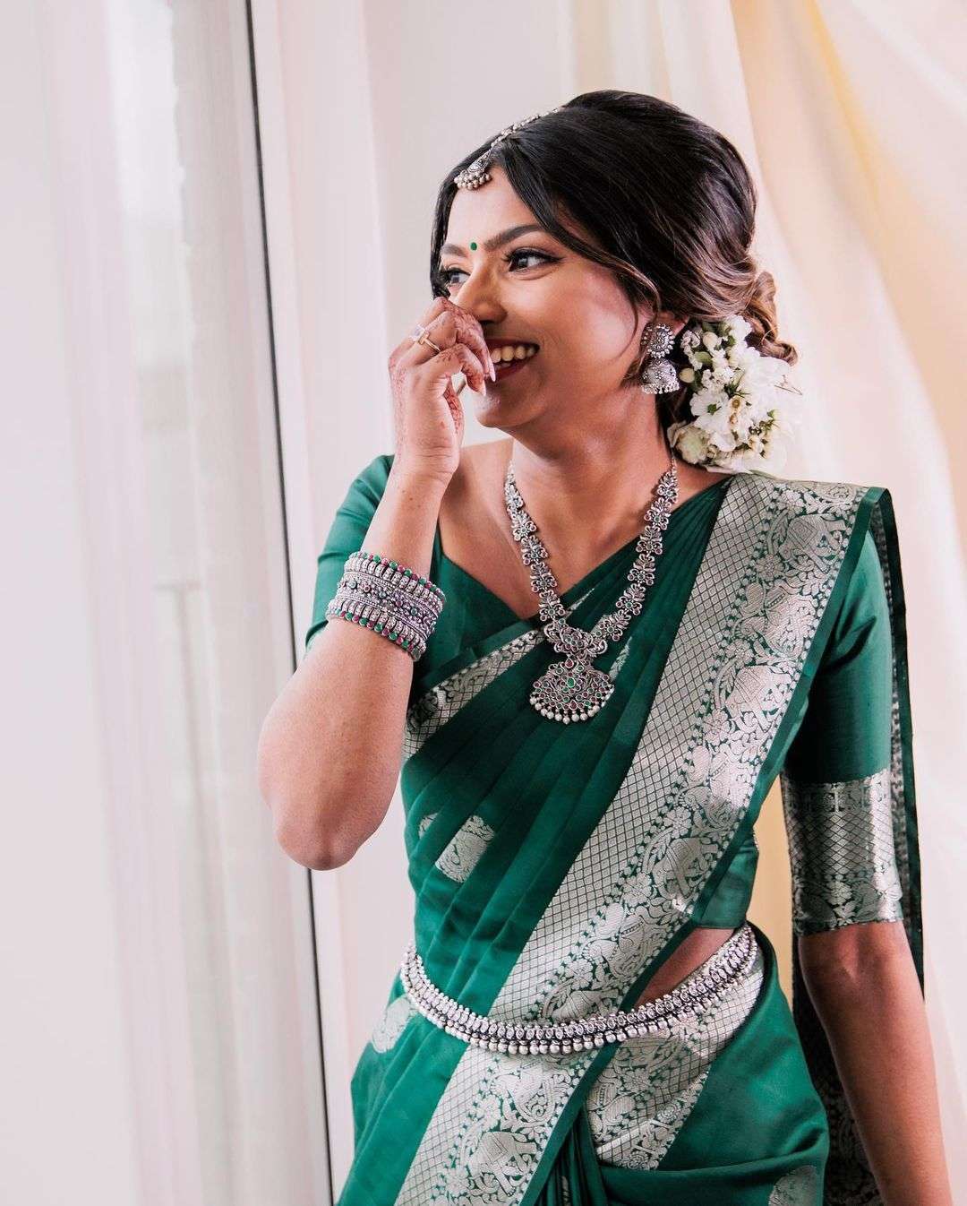 Exquisite Green Banarasi Silk Saree With Uplifting Blouse Piece