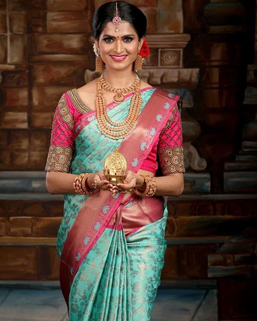 Exquisite Firozi Soft Silk Saree With Delightful Blouse Piece
