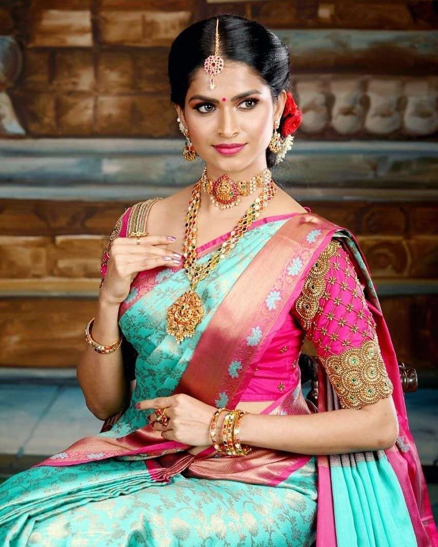 Exquisite Firozi Soft Silk Saree With Delightful Blouse Piece