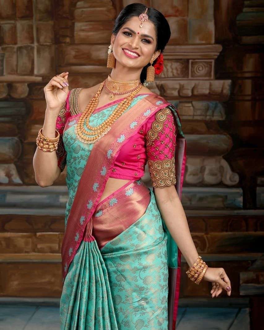 Exquisite Firozi Soft Silk Saree With Delightful Blouse Piece