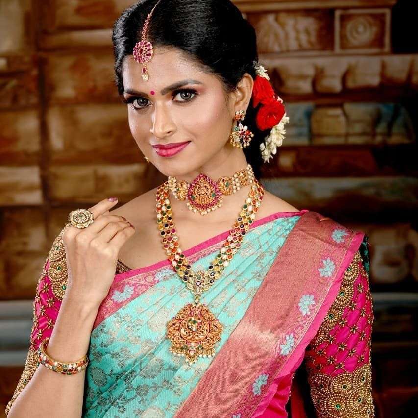 Exquisite Firozi Soft Silk Saree With Delightful Blouse Piece