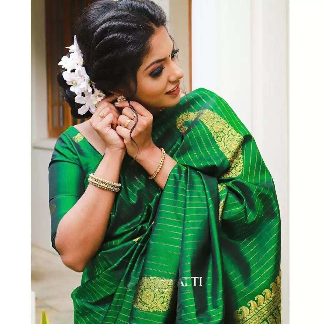 Adorable Green Soft Silk Saree With Fugacious Blouse Piece