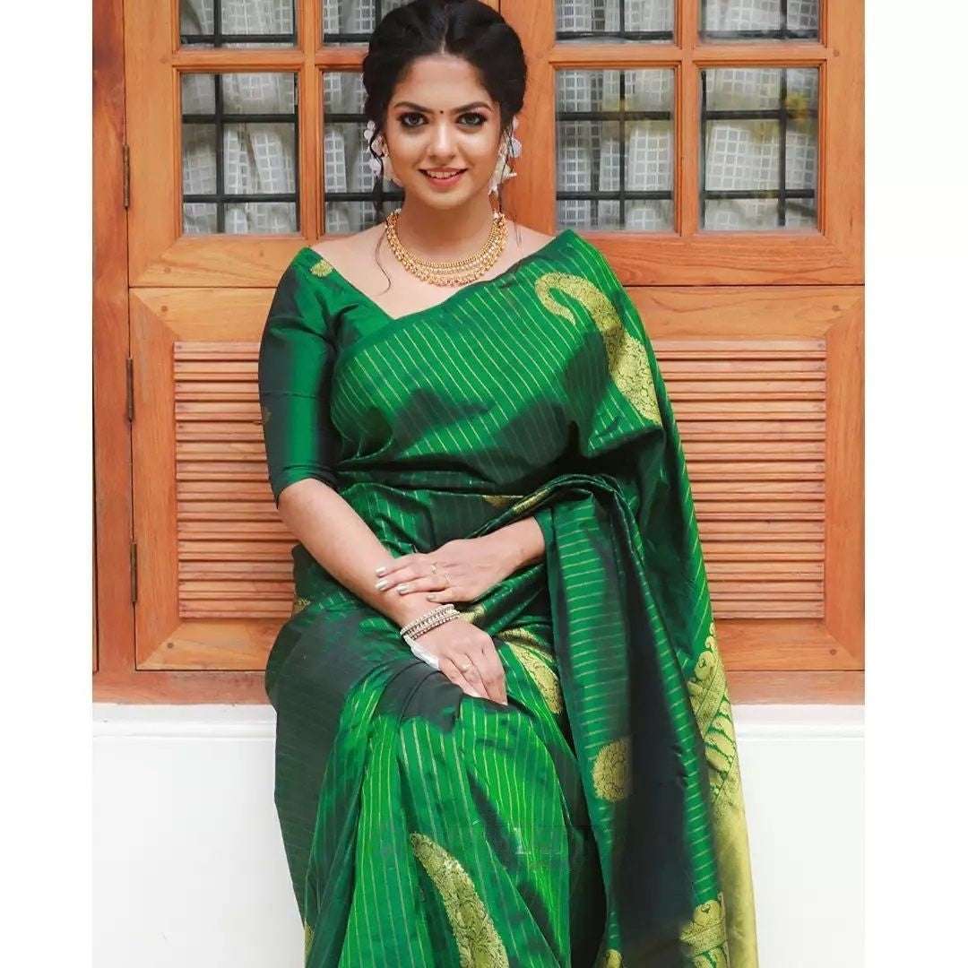 Adorable Green Soft Silk Saree With Fugacious Blouse Piece